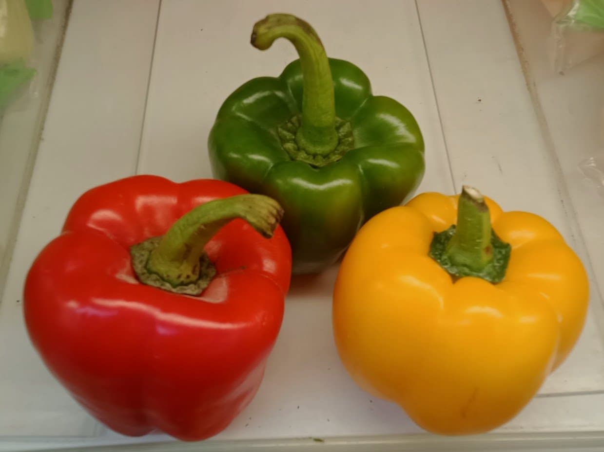 Red, yellow and green bell peppers