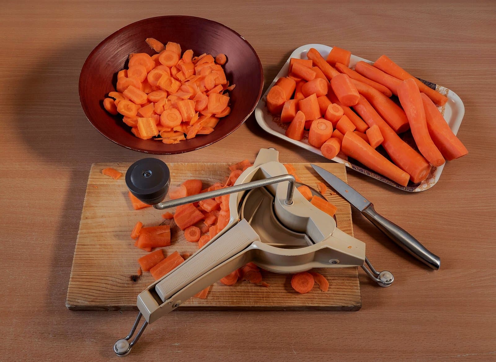 Carrots being prepared on a cutting board